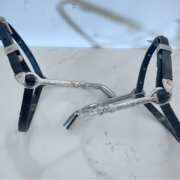 Engraved English 1” spurs by Holly Spagnola with initial C